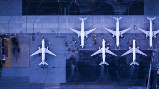 Planes in a row at airport